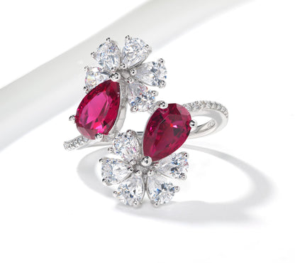 Kathy Levine Sterling Silver White and Ruby Cubic Zirconia Double Flower Pear and Round Bypass Ring