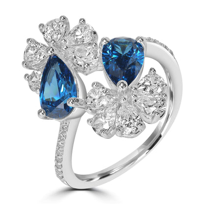 Kathy Levine Sterling Silver White and Sapphire Cubic Zirconia Double Flower Pear and Round Bypass Ring